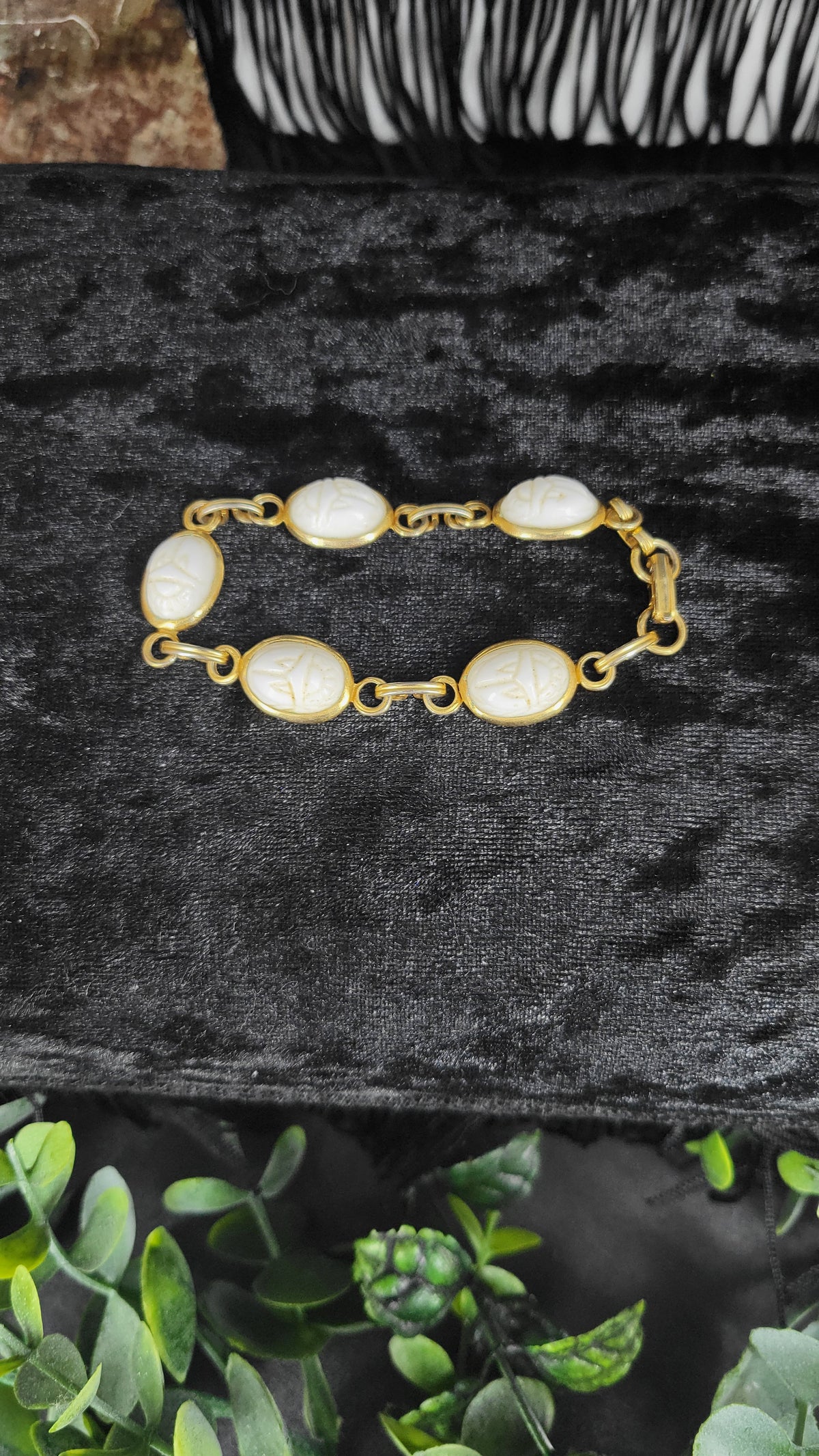 VINTAGE WHITE SCARAB BRACELET

A little relic for the collector of beautiful things.

Vintage white scarab bracelet with an old-world presence and just the right touch of mystery. The scarab has long been associated with renewal, transformation, and the e