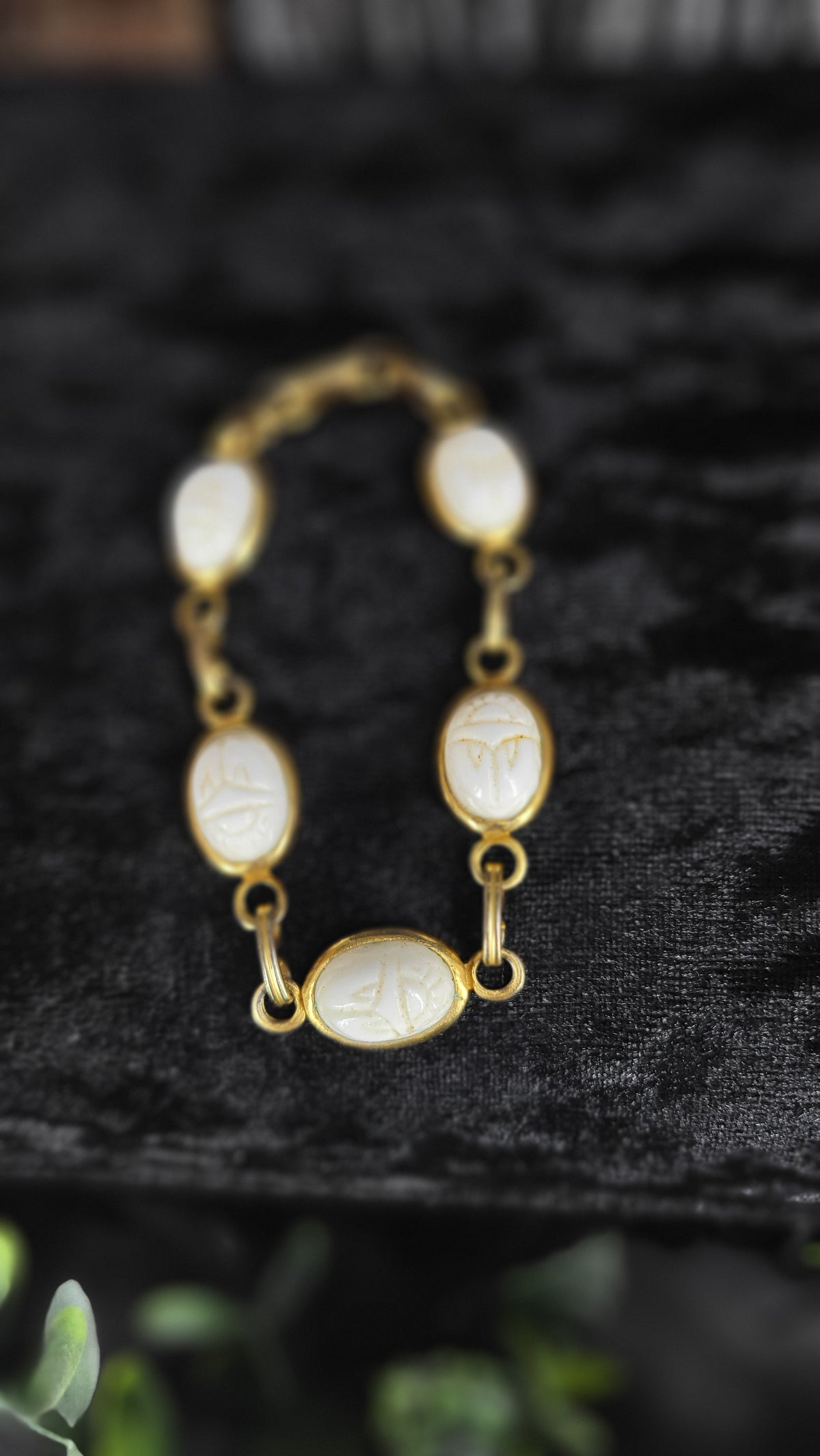 VINTAGE WHITE SCARAB BRACELET

A little relic for the collector of beautiful things.

Vintage white scarab bracelet with an old-world presence and just the right touch of mystery. The scarab has long been associated with renewal, transformation, and the e