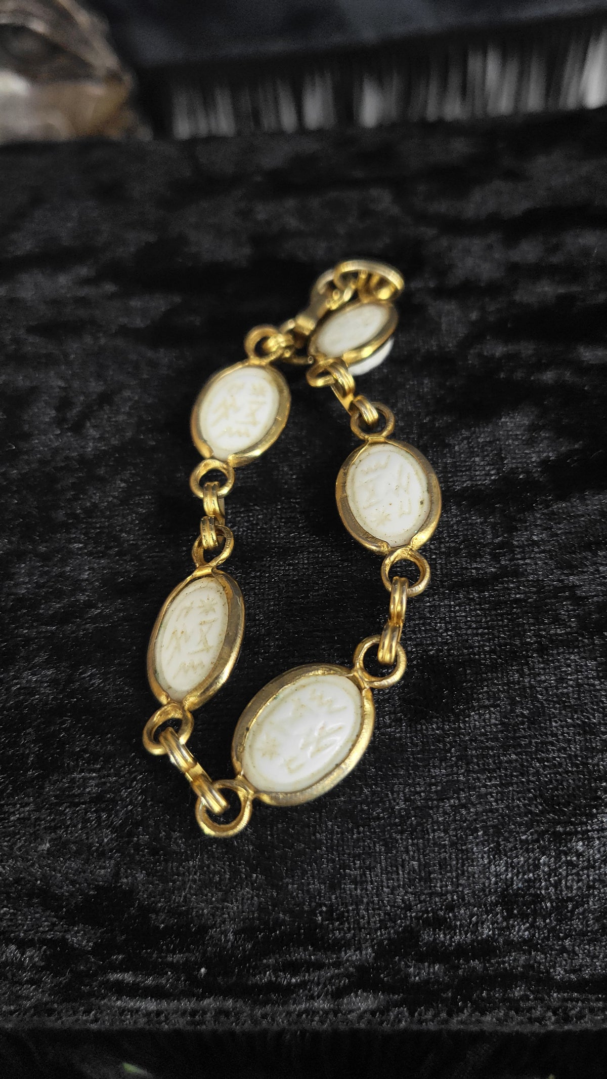 VINTAGE WHITE SCARAB BRACELET

A little relic for the collector of beautiful things.

Vintage white scarab bracelet with an old-world presence and just the right touch of mystery. The scarab has long been associated with renewal, transformation, and the e